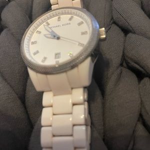 Woman’s white watch. Plastic band